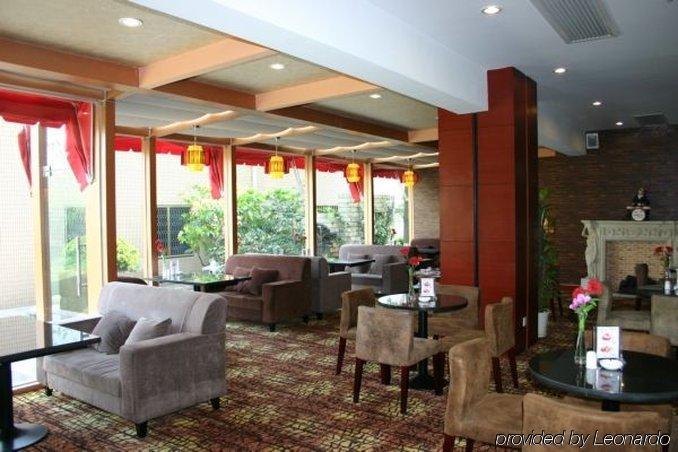 Suzhou Taoyuan International Holiday Hotel Ресторан фото