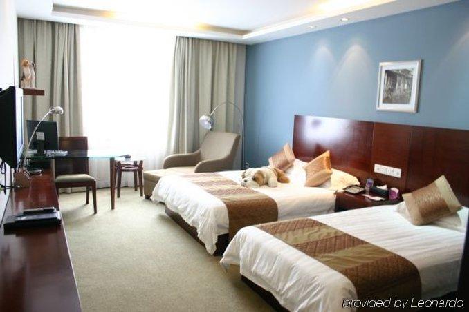 Suzhou Taoyuan International Holiday Hotel Номер фото